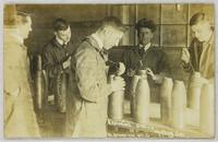 Examining Shells, P. L. Robertson Mfg. Co.