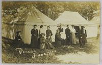 People in front of tents