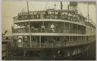 Passenger steamship in dock. Four storey.