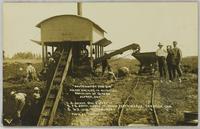 "Government Peat Bog" Anrep Machine in Operation 1. A. Anrep, Gov. Expert 2. F.B. Smith, V. Pres. of Canada Fertilizer Co. Farnham Can. 3. W.R. Love, Treasurer " " " ".